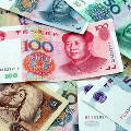 Китайская валюта стремительно обесценивается